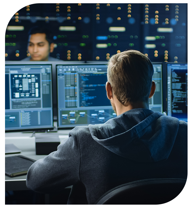 Workers reviewing in their monitors, console information and code